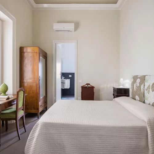 Villa Donna Luigia bedroom with antique wardrobe